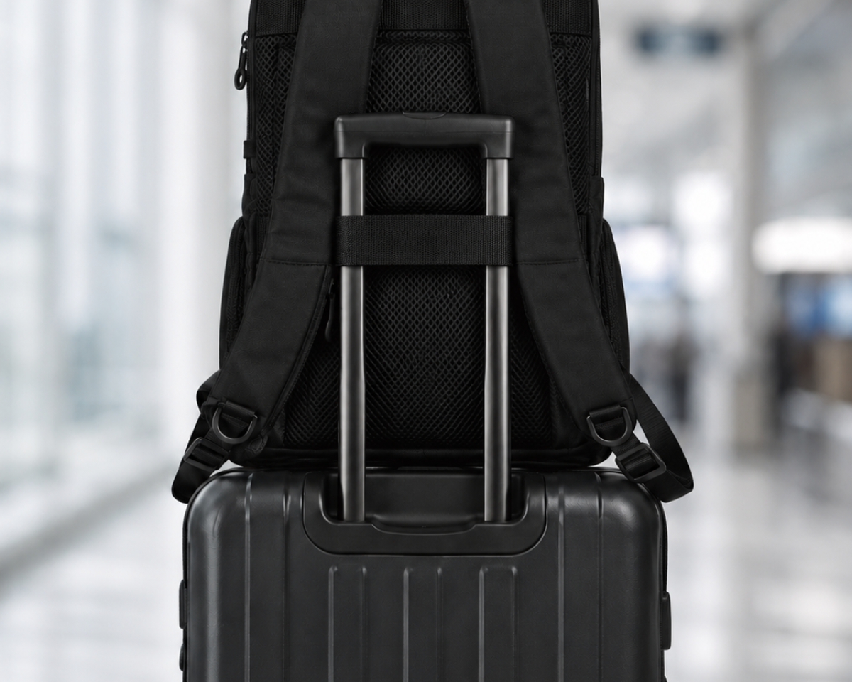Corporate gifts Calgary: Envoy business backpack on a carry-on suitcase for business travel