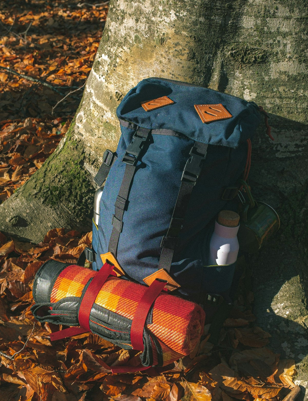 blue and beige camping backpack