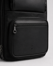 Lower front zip pocket with embossed VENQUE logo