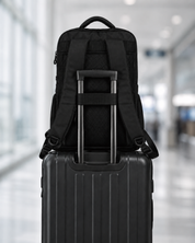 Envoy Business Pack on a carry-on suitcase using the luggage pass-through